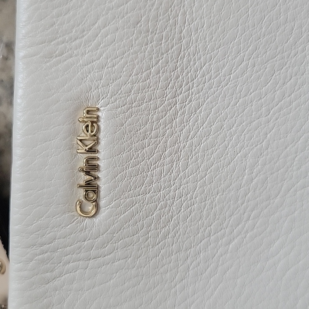 Calvin Klein Tan and White Crossbody Bag with Sleek Design - Picture 2 of 13
